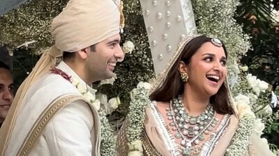 A fan page has also posted an unseen photo of Parineeti and Raghav from their wedding. The candid picture seems to have been taken by a wedding guest right after the varmala ceremony. In the photo, Parineeti and Raghav held hands as they smiled bright. A fan page has also posted an unseen photo of Parineeti and Raghav from their wedding. The candid picture seems to have been taken by a wedding guest right after the varmala ceremony. In the photo, Parineeti and Raghav held hands as they smiled bright.