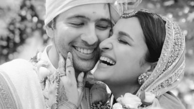 Parineeti Chopra and Raghav Chadha also posted a candid black-and-white photo from their wedding album. It showed the two embracing each other and lost in the moment as they married surrounded by their close friends and family. In the photo, Parineeti touched Raghav's face after performing their wedding rituals. Parineeti Chopra and Raghav Chadha also posted a candid black-and-white photo from their wedding album. It showed the two embracing each other and lost in the moment as they married surrounded by their close friends and family. In the photo, Parineeti touched Raghav's face after performing their wedding rituals.