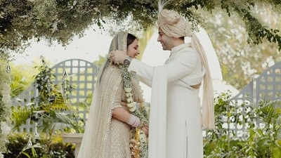 Parineeti Chopra and Raghav Chadha tied the knot in Udaipur and announced their nuptials in classic celebrity style with a curated Instagram post; a part of their caption read, “So blessed to finally be Mr and Mrs..." In one of the photos, they posted, Raghav put a floral garland around Parineeti's neck during the varmala ceremony. Their wedding outfits matched not only each other's but also the dreamy decor. Parineeti Chopra and Raghav Chadha tied the knot in Udaipur and announced their nuptials in classic celebrity style with a curated Instagram post; a part of their caption read, “So blessed to finally be Mr and Mrs..." In one of the photos, they posted, Raghav put a floral garland around Parineeti's neck during the varmala ceremony. Their wedding outfits matched not only each other's but also the dreamy decor.
