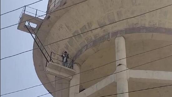 23-year-old Radhe Shyaam climbed up on an overhead water tank in Rajasthan’s Bharatpur (HT Photo)
