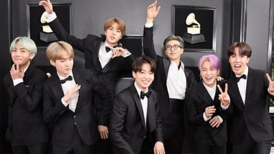BTS' V, Suga, Jin, Jungkook, RM, Jimin and J-Hope in a photo. BTS' V, Suga, Jin, Jungkook, RM, Jimin and J-Hope in a photo.