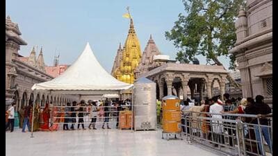 Devotees stand in a queue to offer prayers at Kashi Vishwanath Dham on the first day of Sawan month, in Varanasi. (ANI File Photo) Devotees stand in a queue to offer prayers at Kashi Vishwanath Dham on the first day of Sawan month, in Varanasi. (ANI File Photo)