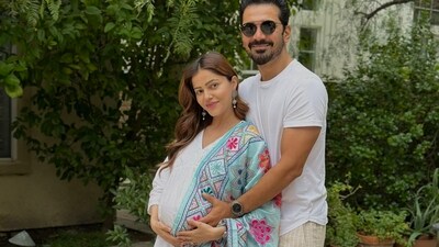 Rubina Dilaik and Abhinav Shukla earlier posed together for a maternity photoshoot. Abhinav held her close as Rubina cradled her baby bump in the picture. She was dressed in a white kurta outfit with a colourful pink and blue dupatta. (Instagram/@rubinadilaik) Rubina Dilaik and Abhinav Shukla earlier posed together for a maternity photoshoot. Abhinav held her close as Rubina cradled her baby bump in the picture. She was dressed in a white kurta outfit with a colourful pink and blue dupatta. (Instagram/@rubinadilaik)