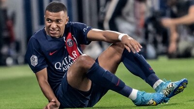 Paris Saint-Germain's French forward #07 Kylian Mbappe grimaces as he sits on the pitch during the French L1 football match (AFP) Paris Saint-Germain's French forward #07 Kylian Mbappe grimaces as he sits on the pitch during the French L1 football match (AFP)