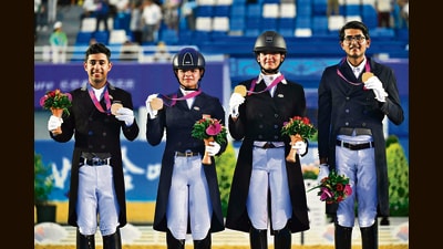 Gold medallists Anush Agarwalla Sudipti Hajela, Divyakriti Singh, and Hriday Vipul Chheda. (AFP)