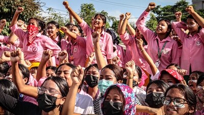 Students shout slogans during a protest against the killing of two missing students by unknown miscreants and the restoration of peace in India's northeastern state of Manipur in Imphal (AFP)