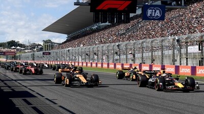 Red Bull driver Max Verstappen of the Netherlands, right, leads the field after the start during the Japanese Formula One Grand Prix at the Suzuka Circuit (AP) Red Bull driver Max Verstappen of the Netherlands, right, leads the field after the start during the Japanese Formula One Grand Prix at the Suzuka Circuit (AP)
