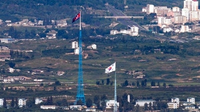 South Korea: Flags of North Korea, rear, and South Korea, front, flutter in the wind. (AP) South Korea: Flags of North Korea, rear, and South Korea, front, flutter in the wind. (AP)