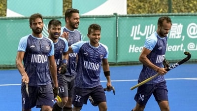 Indian players after scoring a goal against Singapore during the men's hockey match at the 19th Asian Games, in Hangzhou (PTI) Indian players after scoring a goal against Singapore during the men's hockey match at the 19th Asian Games, in Hangzhou (PTI)