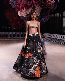 Shivan & Narresh created a risqué blouse revealing the underbust.