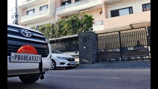 The lengthy raid continued late into the evening, during which the Income Tax officials seized various documents and electronic records from the premises. (Manish/HT)