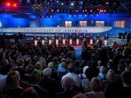 FILE - GOP presidential candidates stand behind their podiums during the CNN Republican presidential debate at the Ronald Reagan Presidential Library and Museum in Simi Valley, Calif., on Sept. 16, 2015. 