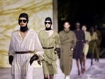 Models present creations by designer Anthony Vaccarello as part of his Spring/Summer 2024 Women's ready-to-wear collection show for fashion house Saint Laurent during Paris Fashion Week.