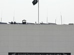 Security personnel stand guard on top of the parliament house building in Islamabad on August 9, 2023. Pakistan's parliament was dissolved on August 9, ushering in a technocrat-led interim government to oversee an election that will not include the country's most popular politician, Imran Khan. (Photo by Aamir QURESHI / AFP) Security personnel stand guard on top of the parliament house building in Islamabad on August 9, 2023. Pakistan's parliament was dissolved on August 9, ushering in a technocrat-led interim government to oversee an election that will not include the country's most popular politician, Imran Khan. (Photo by Aamir QURESHI / AFP)