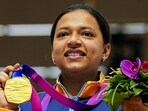 Indian shooter Sift Kaur Samra poses for photos with her gold medal during the presentation ceremony of the women's 50m rifle 3 positions event at the 19th Asian Games