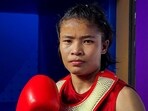 India's Naorem Roshibina Devi poses after defeating Vietnam's Thi Thu Thuy Nguyen in Women's 60 kg Wushu semifinal at the 19th Asian Games India's Naorem Roshibina Devi poses after defeating Vietnam's Thi Thu Thuy Nguyen in Women's 60 kg Wushu semifinal at the 19th Asian Games
