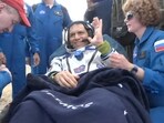International Space Station (ISS) crew member and NASA astronaut Frank Rubio rests after landing in the Soyuz MS-23 space capsule in a remote area near Zhezkazgan, Kazakhstan on Wednesday.(via REUTERS)