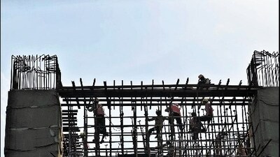Labourers at work in Delhi's Sarai Kale Khan. Labourers at work in Delhi's Sarai Kale Khan.