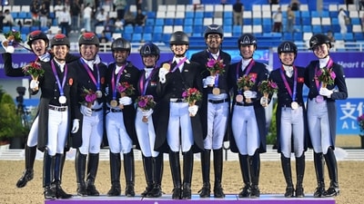Chheda and Emerald (horse name) scored 69.941, Divyakriti and astride Adrenalin Firdod (horse) got 68.176, while Sudipti and astride Chinski secured 66.706 to finally end India's wait for a gold on Day 3 of the Games. (AFP)