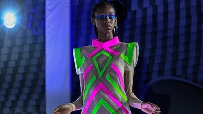 A model walks down the catwalk at the Pierre Cardin show during Paris Fashion Week Womenswear Spring/Summer 2024. La Maison Pierre Cardin, whose nephew Rodrigo Basilicati-Cardin spearheaded its return to the official calendar in March, will stage a new show amid a row over who will succeed the late couturier in 2020. (JULIEN DE ROSA / AFP) A model walks down the catwalk at the Pierre Cardin show during Paris Fashion Week Womenswear Spring/Summer 2024. La Maison Pierre Cardin, whose nephew Rodrigo Basilicati-Cardin spearheaded its return to the official calendar in March, will stage a new show amid a row over who will succeed the late couturier in 2020. (JULIEN DE ROSA / AFP)