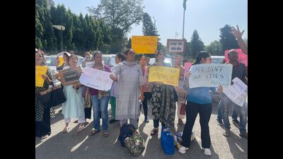 Nurses holding a protest at PGIMER, Chandigarh, on Wednesday. (HT Photo)