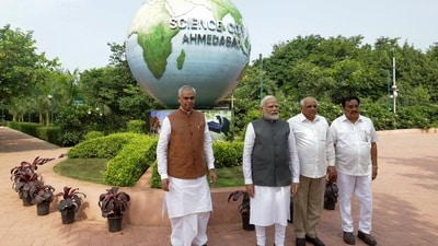 PM Modi with Gujarat Governor Acharya Devvrat and Chief Minister Bhupendra Patel visits Gujarat Science City in Ahmedabad. (PTI)