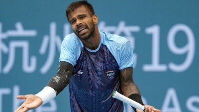 India's Sumit Nagal reacts during the men's singles quarterfinal tennis match against China's Zhizhen Zhang (PTI) India's Sumit Nagal reacts during the men's singles quarterfinal tennis match against China's Zhizhen Zhang (PTI)