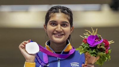 On Wednesday, with the heat on in the sanitised Fuyang Yinhu Sports Centre range, Esha conjured a perfect recipe for a medal and danced her way from mid-table to the top two to continue her fairytale rise. (PTI) On Wednesday, with the heat on in the sanitised Fuyang Yinhu Sports Centre range, Esha conjured a perfect recipe for a medal and danced her way from mid-table to the top two to continue her fairytale rise. (PTI)