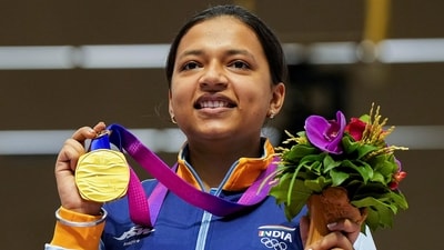 Indian shooter Sift Kaur Samra poses for photos with her gold medal during the presentation ceremony of the women's 50m rifle 3 positions event at the 19th Asian Games (PTI) Indian shooter Sift Kaur Samra poses for photos with her gold medal during the presentation ceremony of the women's 50m rifle 3 positions event at the 19th Asian Games (PTI)