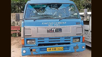 Three officials were injured, while vehicles being used by the Panchkula MC team were also damaged in the attack. (HT Photo) Three officials were injured, while vehicles being used by the Panchkula MC team were also damaged in the attack. (HT Photo)