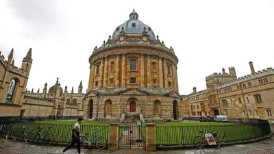 A man walks in front of the buildings of Oxford University. (Reuters) A man walks in front of the buildings of Oxford University. (Reuters)