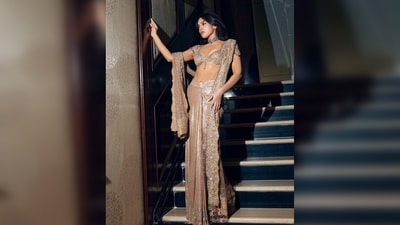 Bhumi Pednekar paired her glamorous outfit with a choker in a contrasting hue that harmonizes with the tassels on her blouse sleeves. (Instagram/@bhumipednekar) Bhumi Pednekar paired her glamorous outfit with a choker in a contrasting hue that harmonizes with the tassels on her blouse sleeves. (Instagram/@bhumipednekar)