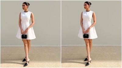 Khushi is dressed from head to toe in Dior. Her white dress features a short neck, a fitted bodice and a flared hemline. She styled her look with a black choker necklace, a mini bag and a pair of black pointy heels. (Instagram/@khushi05k) Khushi is dressed from head to toe in Dior. Her white dress features a short neck, a fitted bodice and a flared hemline. She styled her look with a black choker necklace, a mini bag and a pair of black pointy heels. (Instagram/@khushi05k)