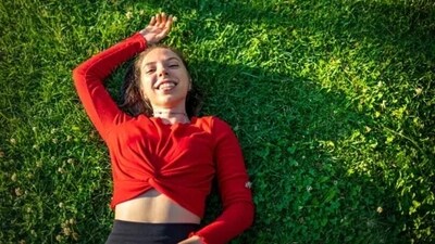 Lying down in grass, touching and feeling the body in nature helps in ensuring ourselves that we are in a safe environment. (Unsplash) Lying down in grass, touching and feeling the body in nature helps in ensuring ourselves that we are in a safe environment. (Unsplash)
