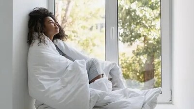 Wrapping ourselves in comfortable clothes or a weighted blanket helps in feeling happy and safe. (Unsplash) Wrapping ourselves in comfortable clothes or a weighted blanket helps in feeling happy and safe. (Unsplash)