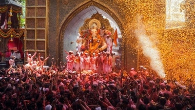 Devotees in large numbers take out a Visarjan procession of Lalbaugcha Raja on the last day of the Ganesh Chaturthi festival at Lal Baug in Mumbai. (ANI) Devotees in large numbers take out a Visarjan procession of Lalbaugcha Raja on the last day of the Ganesh Chaturthi festival at Lal Baug in Mumbai. (ANI)