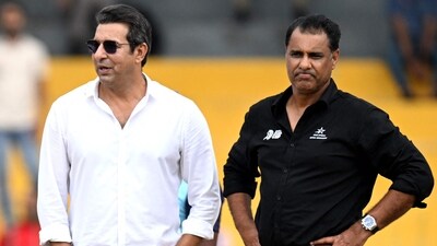 Pakistan's former cricket players Wasim Akram (L) and Waqar Younis inspect the ground before the start of a match (AFP) Pakistan's former cricket players Wasim Akram (L) and Waqar Younis inspect the ground before the start of a match (AFP)