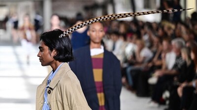 A model presents a creation for Dries Van Noten during a show as part of the Paris Fashion Week Womenswear Spring/Summer 2024 in Paris on September 27, 2023. (Photo by Miguel MEDINA / AFP) A model presents a creation for Dries Van Noten during a show as part of the Paris Fashion Week Womenswear Spring/Summer 2024 in Paris on September 27, 2023. (Photo by Miguel MEDINA / AFP)