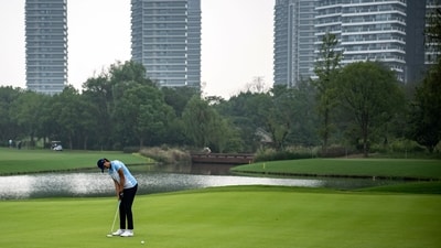 Indian's Aditi Ashok competes in women's individual golf event during the Hangzhou 2022 Asian Games in Hangzhou (AFP) Indian's Aditi Ashok competes in women's individual golf event during the Hangzhou 2022 Asian Games in Hangzhou (AFP)