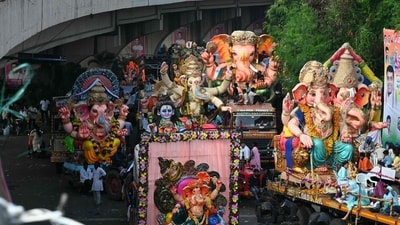 Hindu devotees take part in procession for the immersion of idols of the elephant-headed Hindu God Ganesh in the Hussain Sagar Lake during the last day of the Ganesh Chaturthi festival in Hyderabad. (AFP) Hindu devotees take part in procession for the immersion of idols of the elephant-headed Hindu God Ganesh in the Hussain Sagar Lake during the last day of the Ganesh Chaturthi festival in Hyderabad. (AFP)