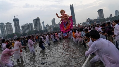 Devotees prepare to immerse a giant idol of elephant-headed Hindu god Ganesha in the Arabian Sea, marking the end of the 10-day long Ganesh Chaturthi festival in Mumbai. (AP) Devotees prepare to immerse a giant idol of elephant-headed Hindu god Ganesha in the Arabian Sea, marking the end of the 10-day long Ganesh Chaturthi festival in Mumbai. (AP)