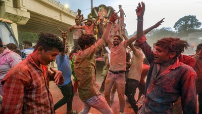 Hindu devotees dance during the immersion of Lord Ganesha idol on last day of Ganesh Chaturthi festival in Ahmedabad. (PTI) Hindu devotees dance during the immersion of Lord Ganesha idol on last day of Ganesh Chaturthi festival in Ahmedabad. (PTI)
