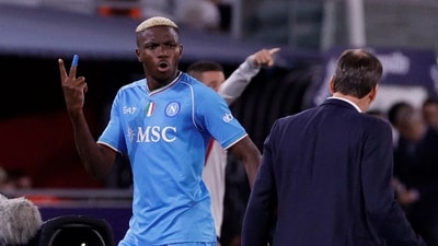 Napoli's Victor Osimhen remonstrates with coach Rudi Garcia after being substituted (REUTERS)
