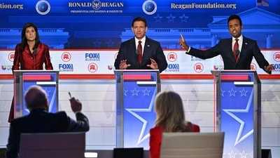 TOPSHOT - (L-R) Former Governor from South Carolina and UN ambassador Nikki Haley, Florida Governor Ron DeSantis, and entrepreneur Vivek Ramaswamy speak during the second Republican presidential primary debate at the Ronald Reagan Presidential Library in Simi Valley, California, on September 27, 2023. (Photo by Robyn BECK / AFP) (AFP) TOPSHOT - (L-R) Former Governor from South Carolina and UN ambassador Nikki Haley, Florida Governor Ron DeSantis, and entrepreneur Vivek Ramaswamy speak during the second Republican presidential primary debate at the Ronald Reagan Presidential Library in Simi Valley, California, on September 27, 2023. (Photo by Robyn BECK / AFP) (AFP)