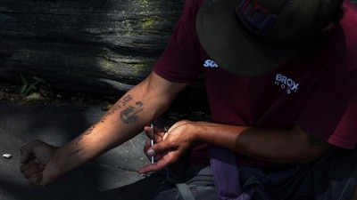 A drug consumer injects a mixture of the opioid fentanyl and heroin at Richman (Echo) Park in the Bronx borough of New York City, U.S., July 20, 2023. (REUTERS)