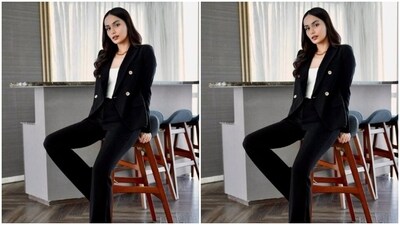 Manushi decked up in a white tank top and teamed it with a black suit and a pair of matching black formal trousers. (Instagram/@manushi_chhillar) Manushi decked up in a white tank top and teamed it with a black suit and a pair of matching black formal trousers. (Instagram/@manushi_chhillar)