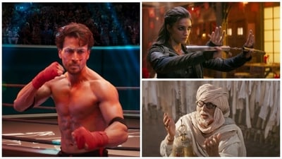 Ganapath teaser:: Tiger Shroff with Kriti Sanon and Amitabh Bachchan in the film. Ganapath teaser:: Tiger Shroff with Kriti Sanon and Amitabh Bachchan in the film.