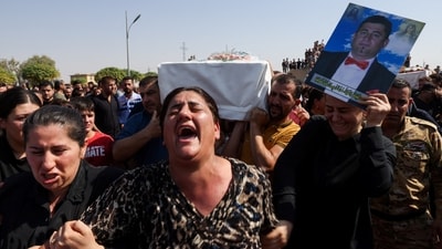 Funeral processions persisted on Thursday at the Saint Behnam Syriac Catholic Church. A video circulated on both Iraqi media and social platforms, depicting the bride and groom mourning within the crowd.&nbsp; (REUTERS)