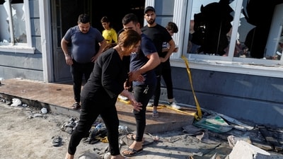 At least 150 people suffered burns, smoke inhalation, and injuries from the stampede, as nearly 900 panicked guests attempted to escape the reception center through its limited exit doors.&nbsp; (REUTERS)
