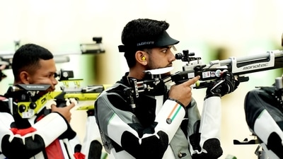 Indian shooter Aishwary Pratap Singh Tomar (R) competes. (PTI) Indian shooter Aishwary Pratap Singh Tomar (R) competes. (PTI)